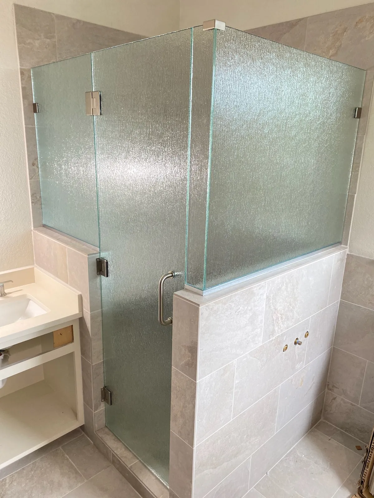 Custom frameless enclosure with notched glass