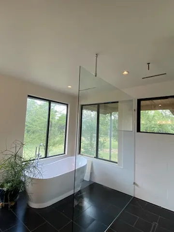Glass to glass corner shower installation