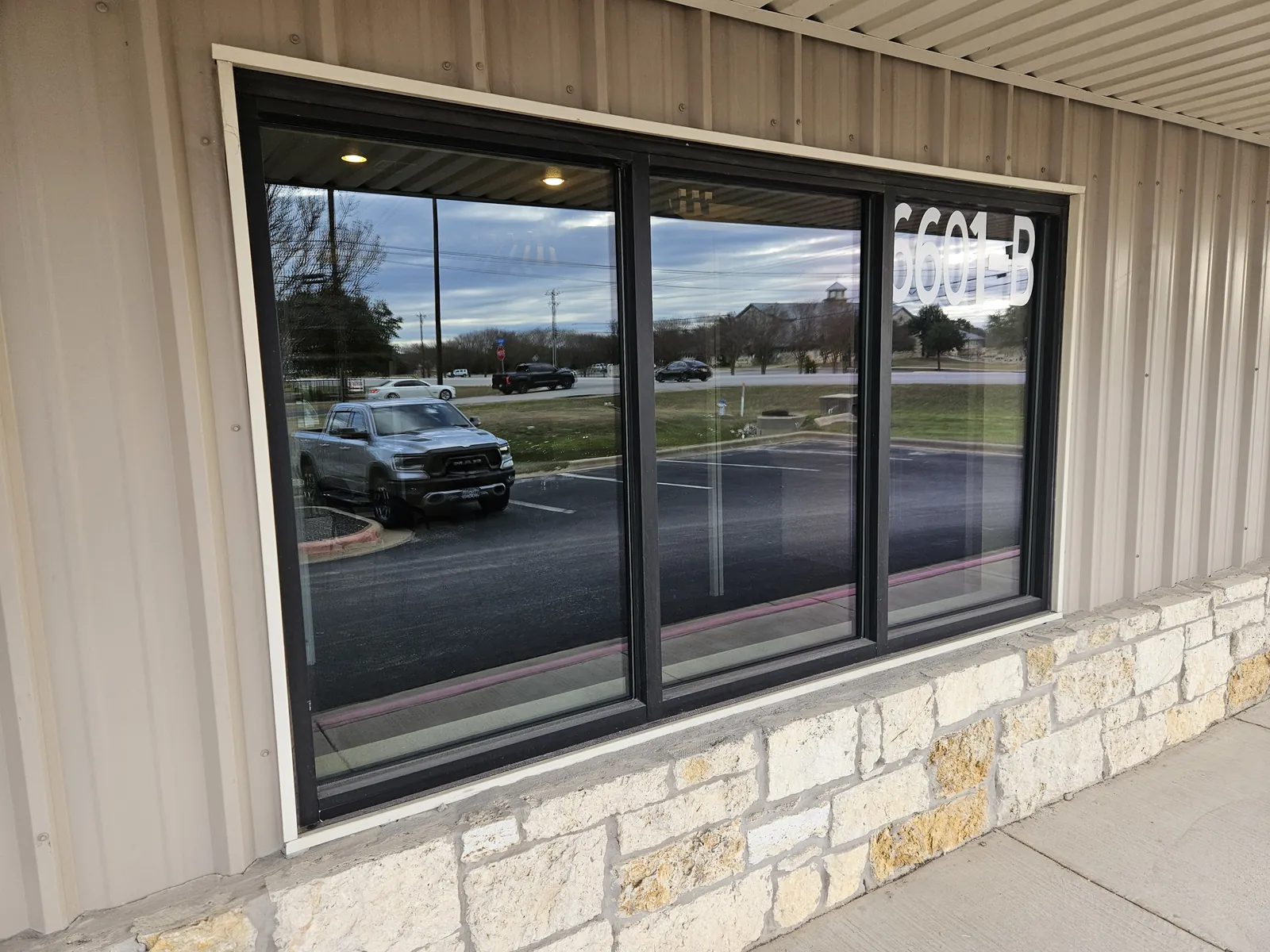 Glass storefront entry doors for a retail business